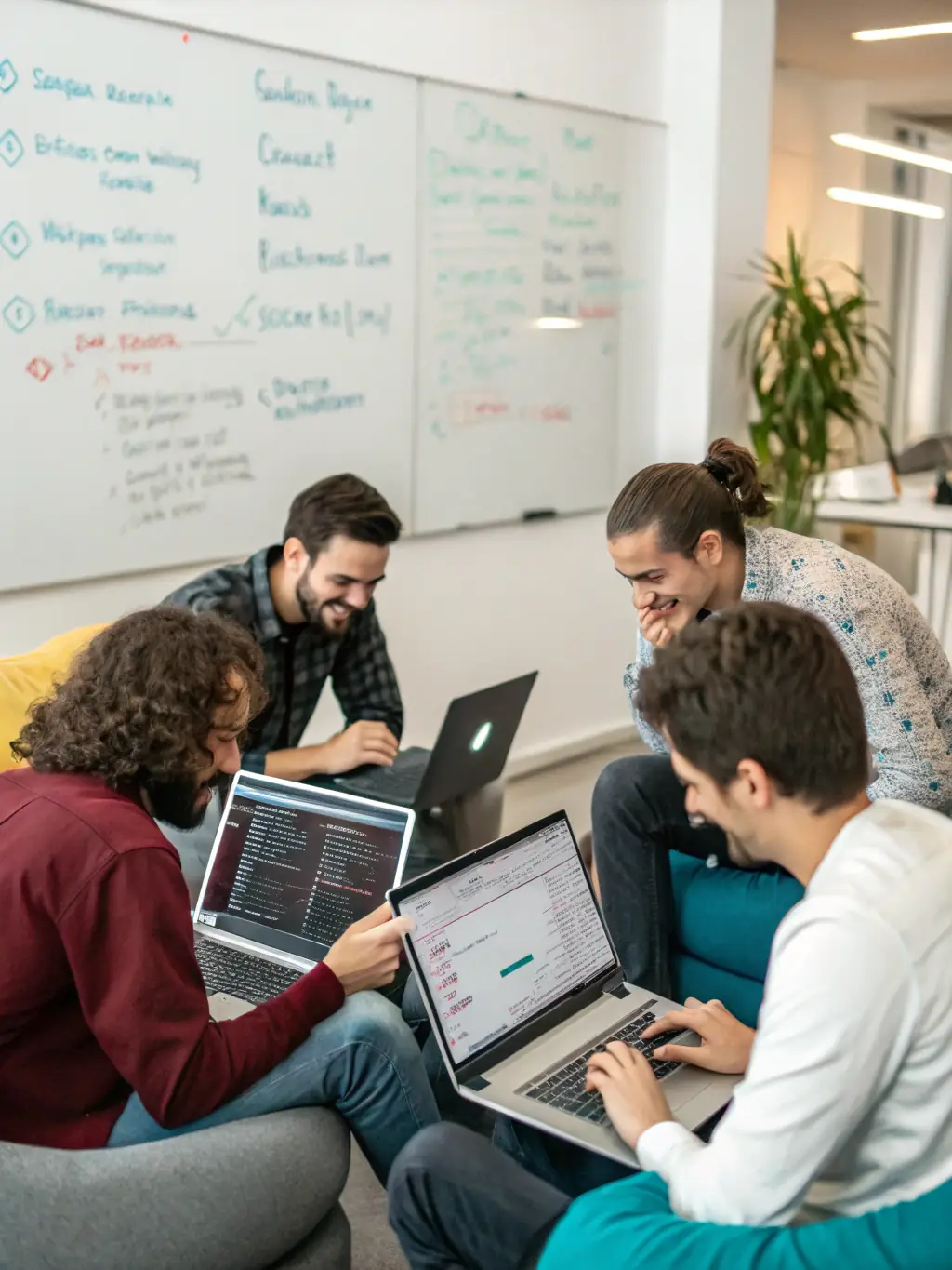 A diverse group of students collaborating on a Python project in a co-working space in Cape Town, South Africa.